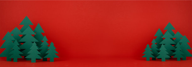 圣诞有趣的孩子气的背景与纸绿云杉林上饱和的节日红色背景在现代极简风格，复制空间，垂直。新年季横幅模型为网页，设计。图片下载