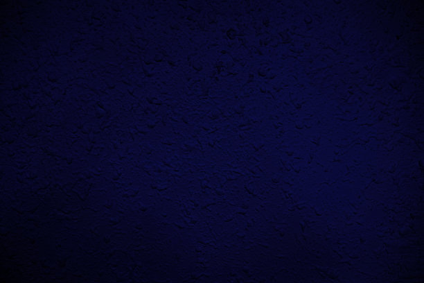 蓝色灰泥墙纹理背景。图片下载