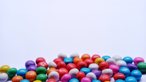 棒棒糖，糖果，大理石糖果俯视图平躺在孤立的白色背景图片下载