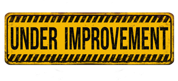 正在改进的老式生锈的金属标志图片下载