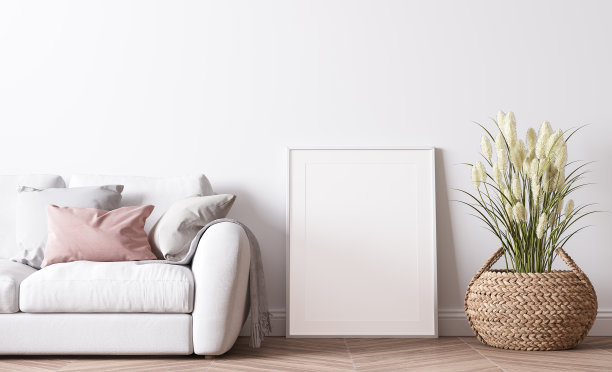 海报框架模型在现代客厅设计，明亮的室内与粉红色和白色的沙发在最小的背景图片下载