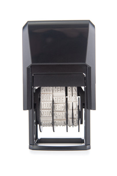 白色背景上的塑料日期图章图片下载