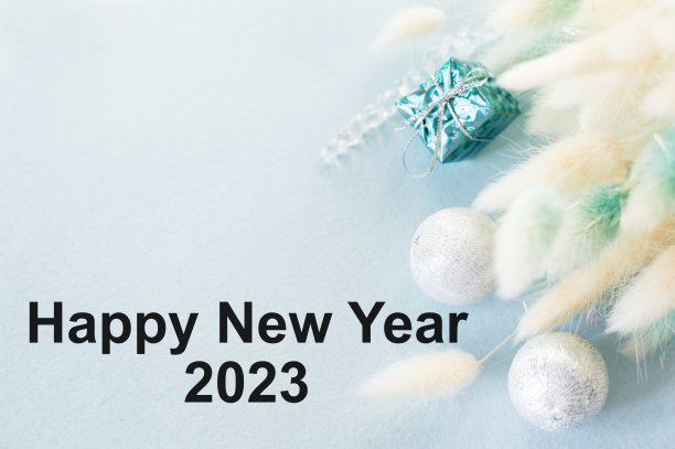 2023年新年快乐的文字在浅蓝色节日背景图片下载