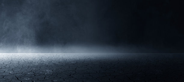 全球变暖造成干旱，土壤开裂干燥，地面开裂，沙漠污染空气，野火使烟雾丛林污染世界，气候变化，全球变暖的概念图片下载