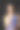 肖像的年轻女子拿着杯子与液体里面。图片下载