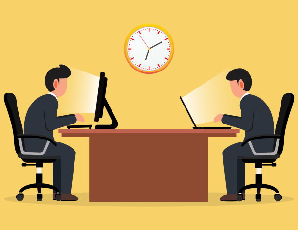 两个在加班的商人。图片下载