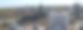 秋天，加拿大萨斯卡通的河流、密集的建筑和树木的全景照片图片下载