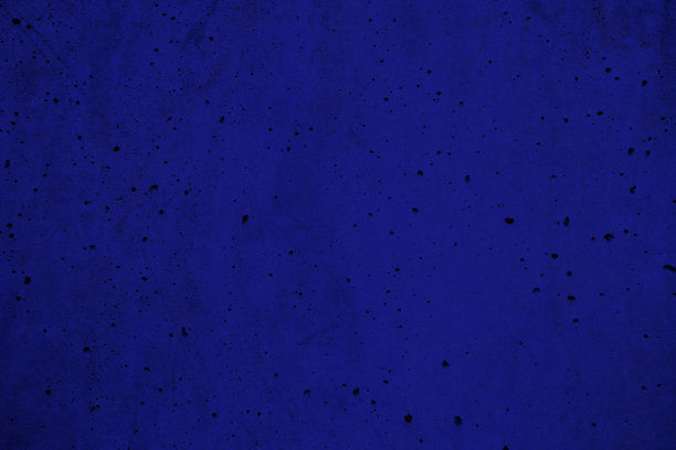 蓝色多孔灰泥墙纹理背景。图片下载