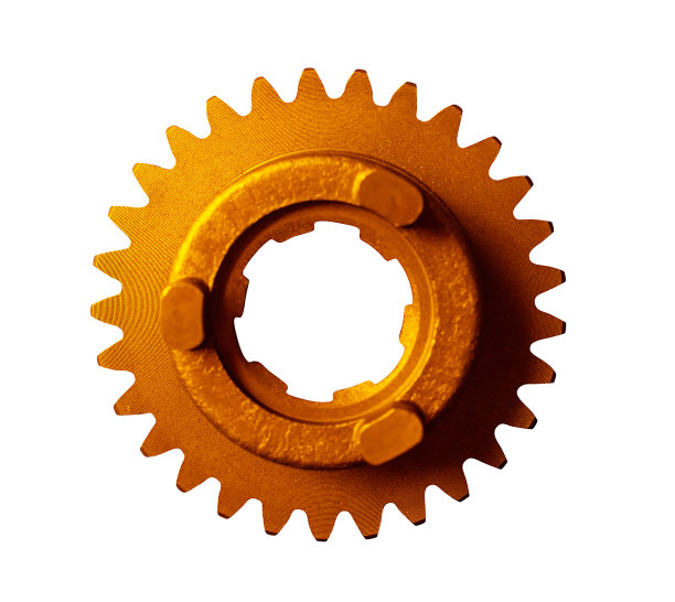黄金齿轮。工业机械。图片下载