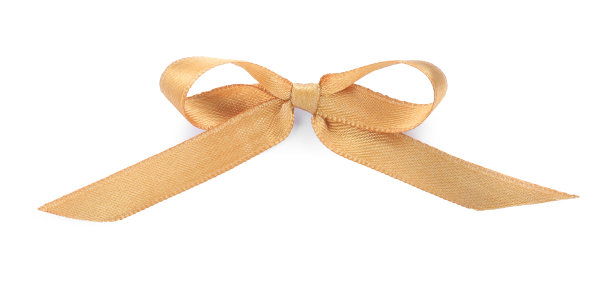 美丽的金色丝带系在蝴蝶结孤立的白色，俯瞰图片下载
