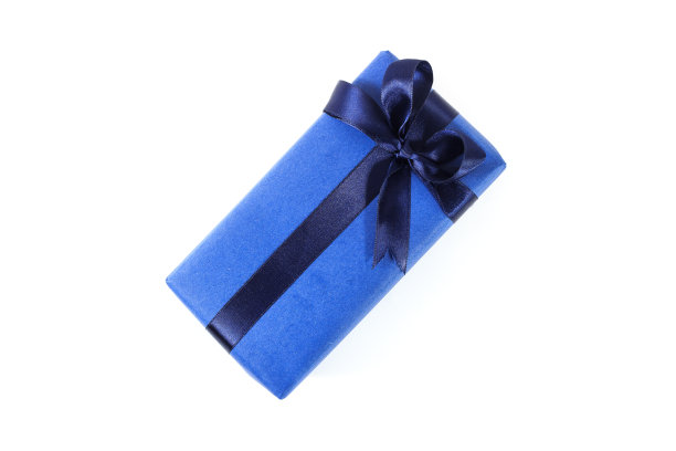 顶视图蓝色礼盒与海军蓝丝带孤立在白色背景。图片下载