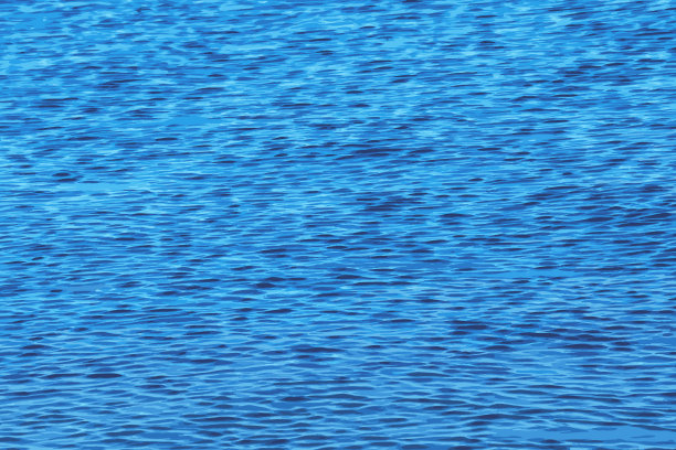 矢量插图的水波纹纹理背景。日落时波浪形的水面，金色的光反射在水中。图片下载