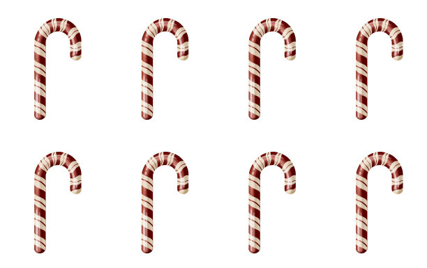 圣诞装饰品由甘蔗制成，在白色背景上有红白条纹，共六件。美味的焦糖拐杖。寒假美食，新年快乐，圣诞快乐。寒假观念，圣诞集市图片下载