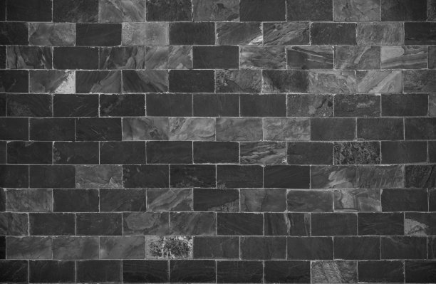 抽象暗砖墙纹理背景图案，墙砖表面纹理。砌砖漆成黑色，室内旧干净的混凝土格栅凹凸不平，家居或办公室设计背景装饰。图片下载