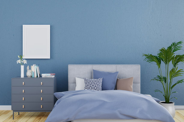 3d渲染插图的蓝色墙壁的卧室与白色的模拟相框。图片下载