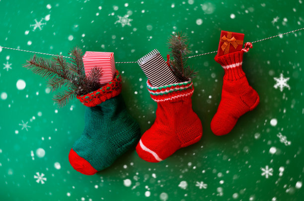 绿色背景的圣诞袜图片下载