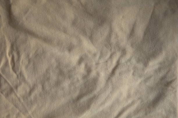 米色棉褶皱织物背景无缝图案的天然纺织品图片下载