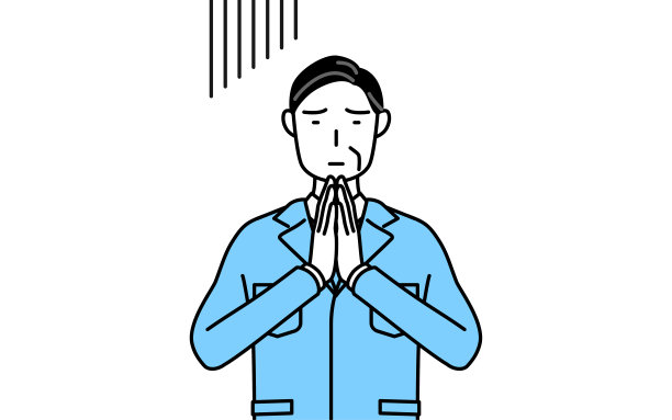 管理人员，经理，工厂经理，一个穿着工作服的男人把手放在身体前面道歉。图片下载