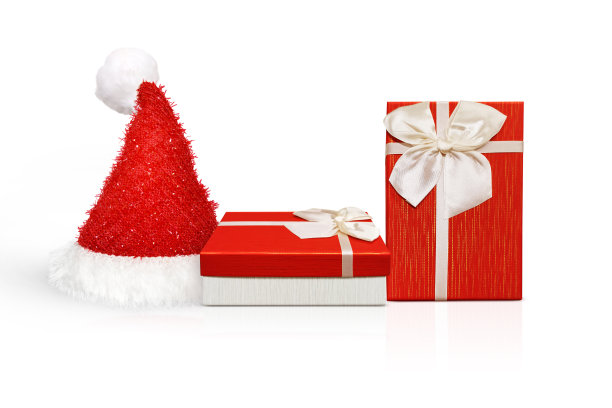 圣诞老人帽子圣诞礼物白色背景。圣诞节，冬天，新年的概念，图片下载