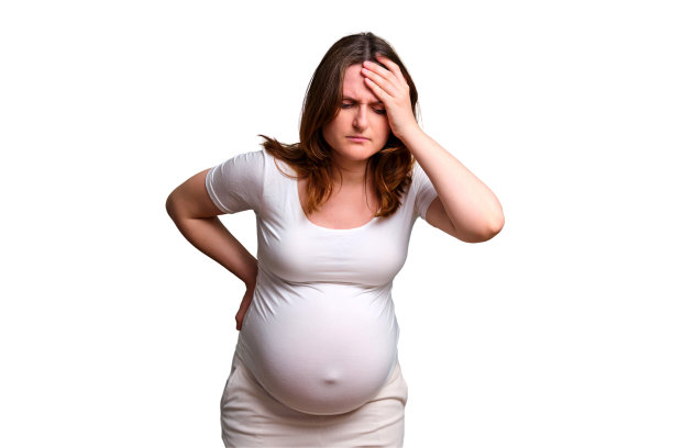 女性怀孕期间的背痛，工作室白色背景图片下载