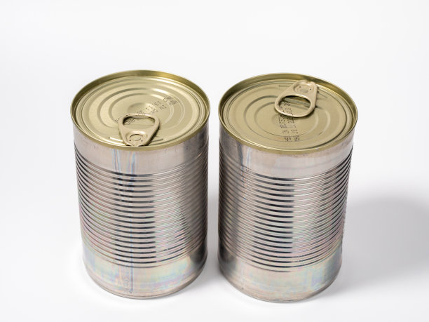 白色背景的罐装剂量。罐头食品。罐。图片下载