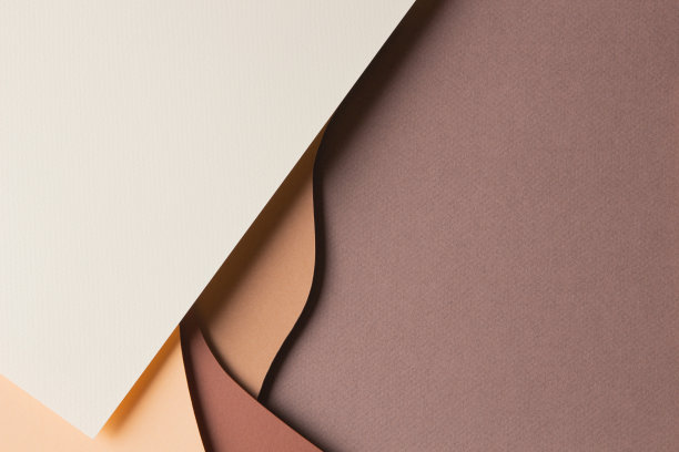 抽象彩纸纹理背景。最小的剪纸风格组成的层次几何形状和线条在米色和棕色的阴影。俯视图图片下载