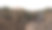 徒步旅行者在悬崖边上给猴面包树拍照图片下载