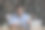 笑着的年轻编辑阅读印刷的有趣的文章草稿图片下载