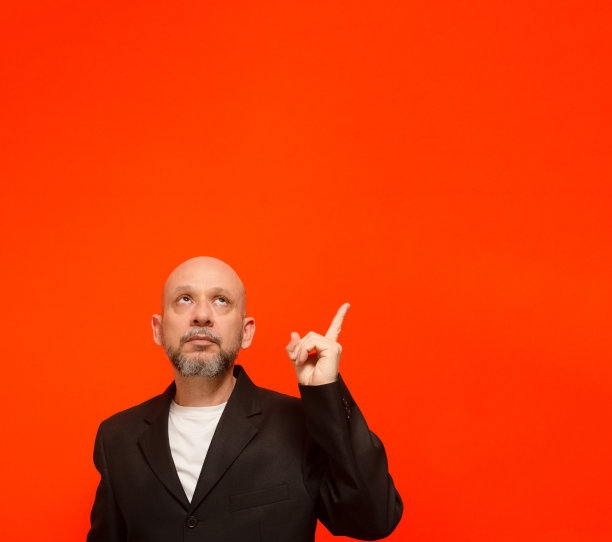 商人，成熟，优雅，手指向上。图片下载