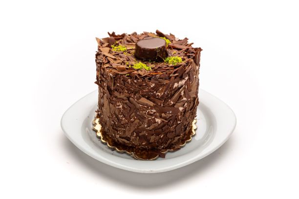 白色背景上的一盘小蛋糕的孤立镜头图片下载