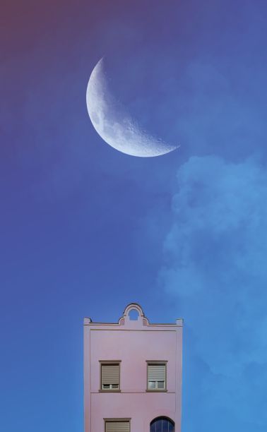 垂直插图的极简主义建筑与新月在天空图片下载