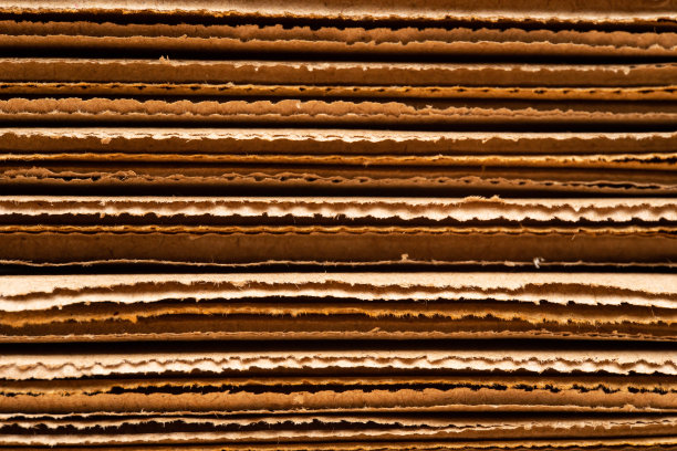 包装用瓦楞纸板。抽象背景水平线与波浪线。图片下载