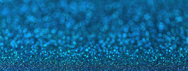 模糊的海军蓝色闪闪发光的背景小亮片为新年或圣诞节，宏观。图片下载