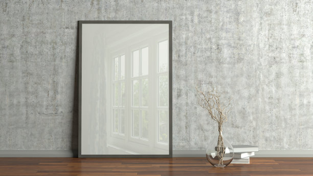 垂直海报框架模拟在客厅地板上的木地板和混凝土墙。图片下载