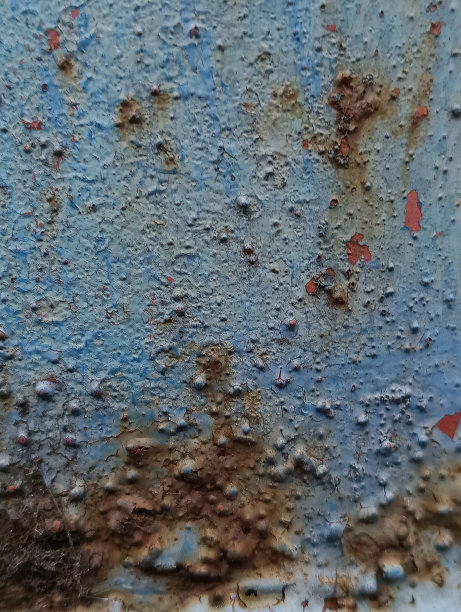 生锈的铁皮背景的特写照片图片下载