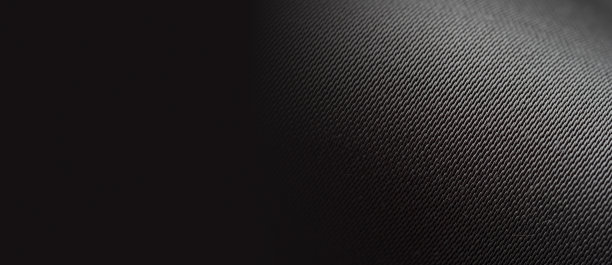 微距摄影真丝灰色面料，纹理，横幅。豪华的黑色缝纫背景。美丽闪亮的缎面面料，特写，复制空间。抽象、极简、单色图片下载