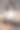 年轻的女商人坐在长凳上，拿着笔记本电脑的现代办公大楼背景图片下载
