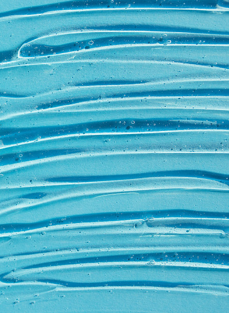 纹理凝胶血清在蓝色背景图片下载