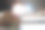 一个男人递上一个灯泡，灯泡上有一个齿轮图标，然后用电脑来寻找灵感。图片下载