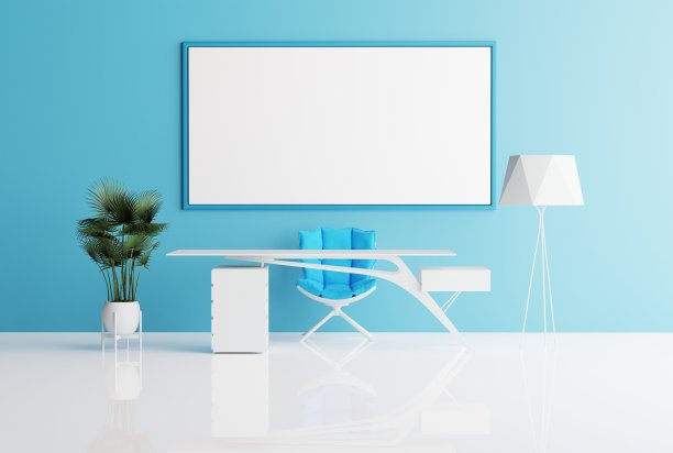 这是一间现代办公室，背景是蓝色墙壁上的空相框。图片下载