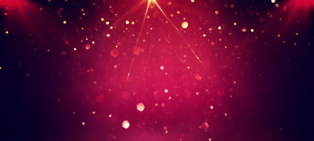 背景抽象的红色，金色和黑色闪烁的灯。散焦图片下载