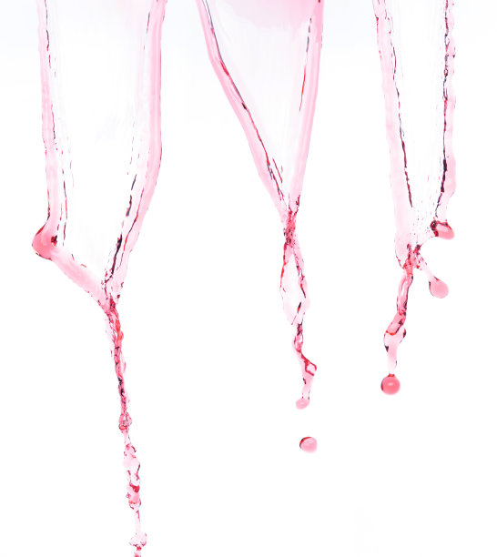 空气中溅出的红色果汁。水红番茄从天而降，净化干净自然。酒形形式的水泼流庆祝白色背景孤立图片下载
