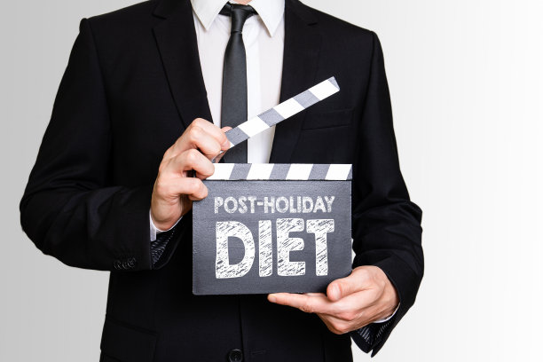 节后饮食概念。商人展示电影拍板图片下载