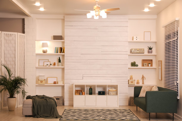 时尚的客厅内饰，舒适的沙发和白色电视柜图片下载