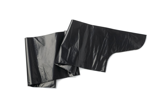 垃圾袋卷隔离。采购产品垃圾包装，新卷塑料垃圾袋，黑色聚乙烯废物容器图片下载