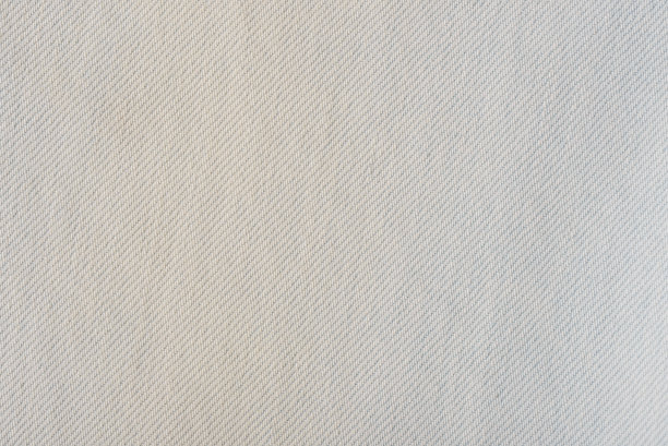 特写镜头的白色牛仔裤纹理背景。图片下载