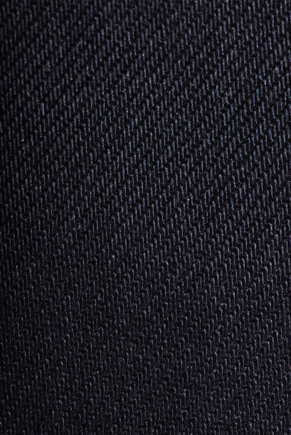 特写镜头的蓝色牛仔裤纹理背景。图片下载