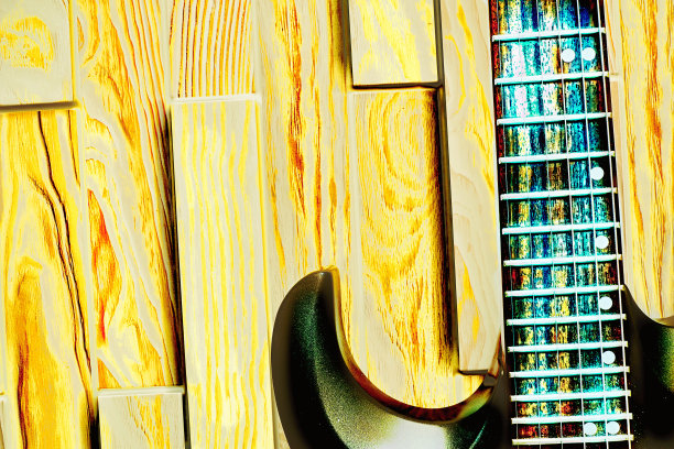 华丽的独立摇滚放克电吉他在霓虹灯黄色的木头表面图片下载