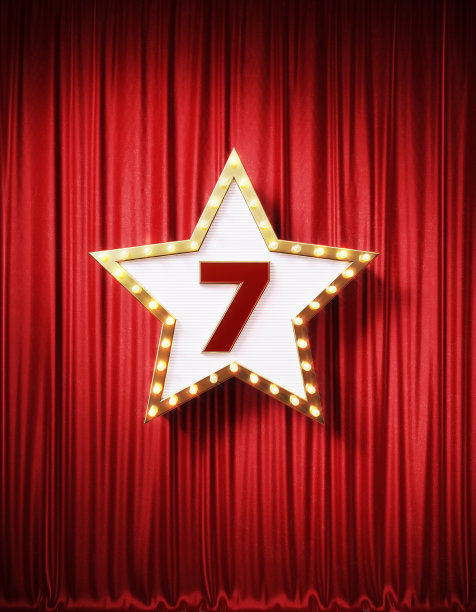 红色窗帘上的星形复古招牌图片下载