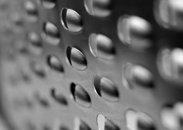 特写背景与穿孔金属光栅图片下载